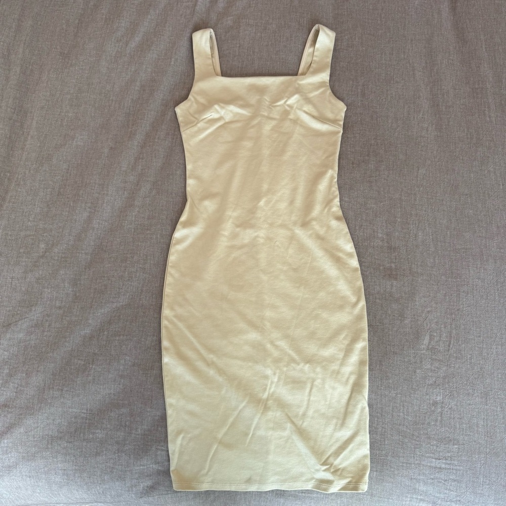 Love Culture's Elegant Cream Sleeveless Bodycon Dress